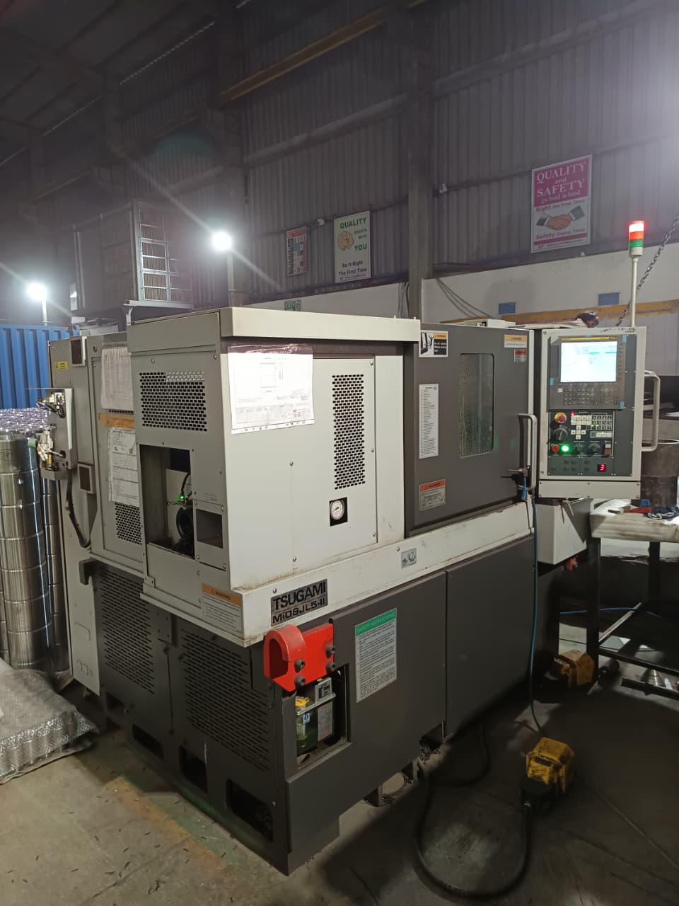 Tsugami CNC turning machine in operation